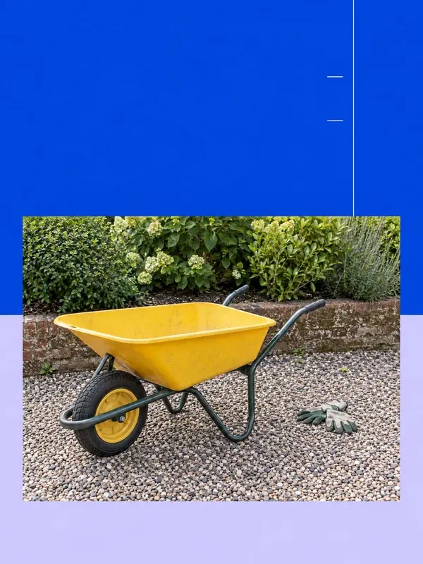 A yellow garden wheelbarrow and two gloves beneath a broad cobalt field in the Cobalt Register Field style