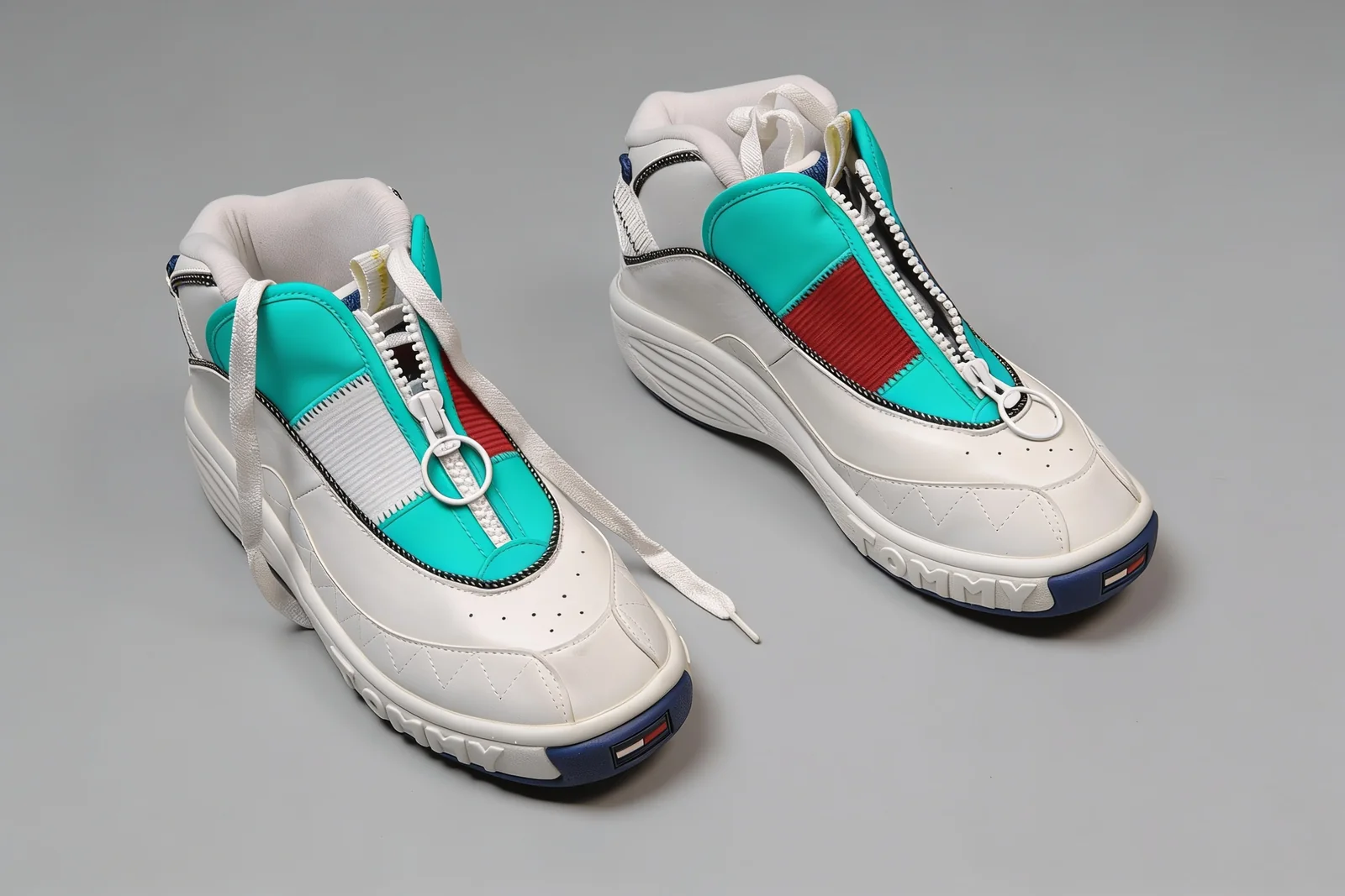 Published result paired with the prompt Recolor the sneakers to teal